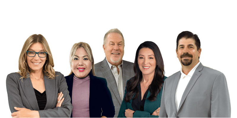 Five professionally dressed adults posed together beneath the Mashburn Zell Group logo on a white background.